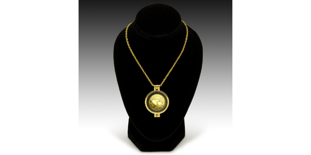     Magyar Éremkibocsátó Kft. -  Színarany érme összefonódó szívekkel medálban